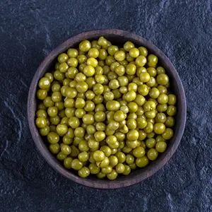 bowl-full-with-green-marinated-green-peas-black-table,1:1